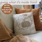 DIY pumpkin pillow on sofa with orange pillow